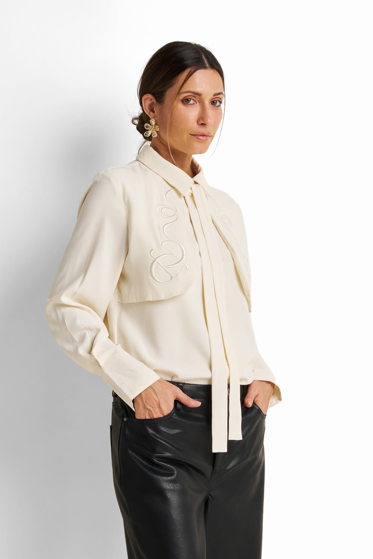 Embroidered yoke tie-neck blouse