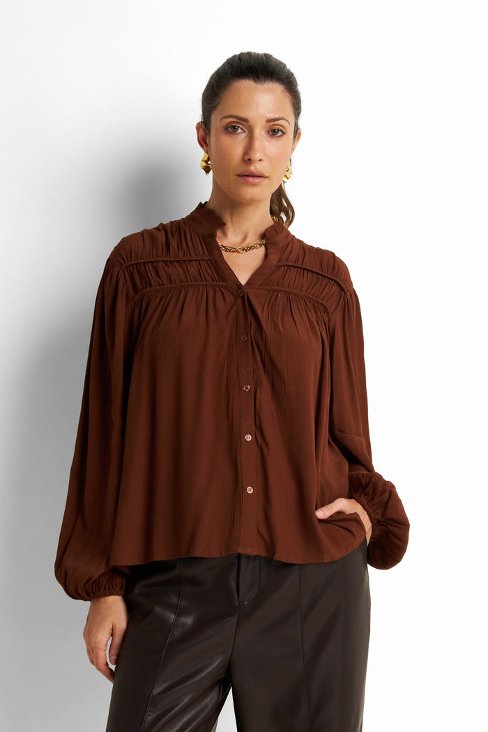 Gathered yoke split-neck blouse