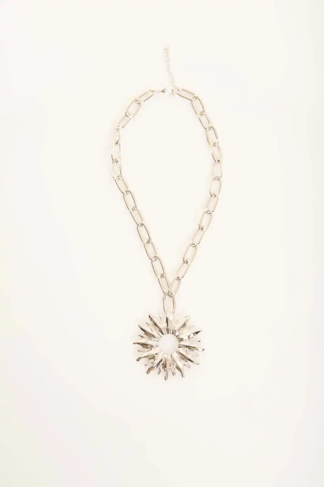 Radiant Sunburst Pendant Necklace – Silver
